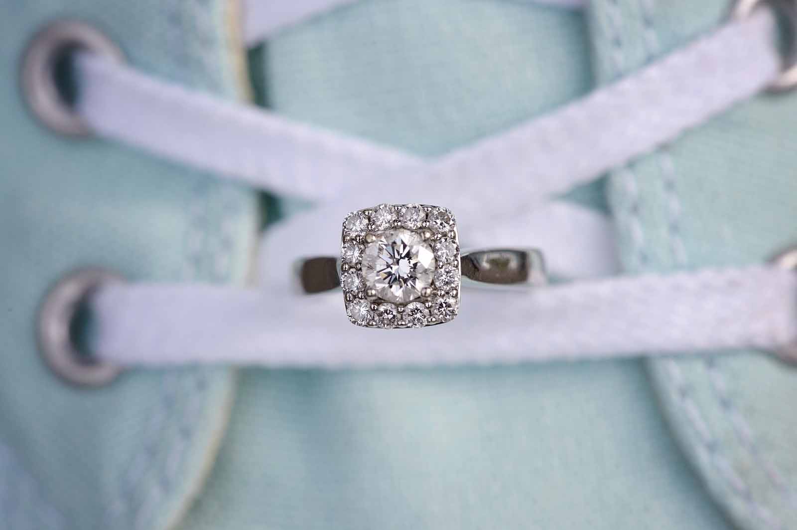 Ottawa engagement photography of a beautiful ring in a Tiffany blue converse shoe in Ottawa