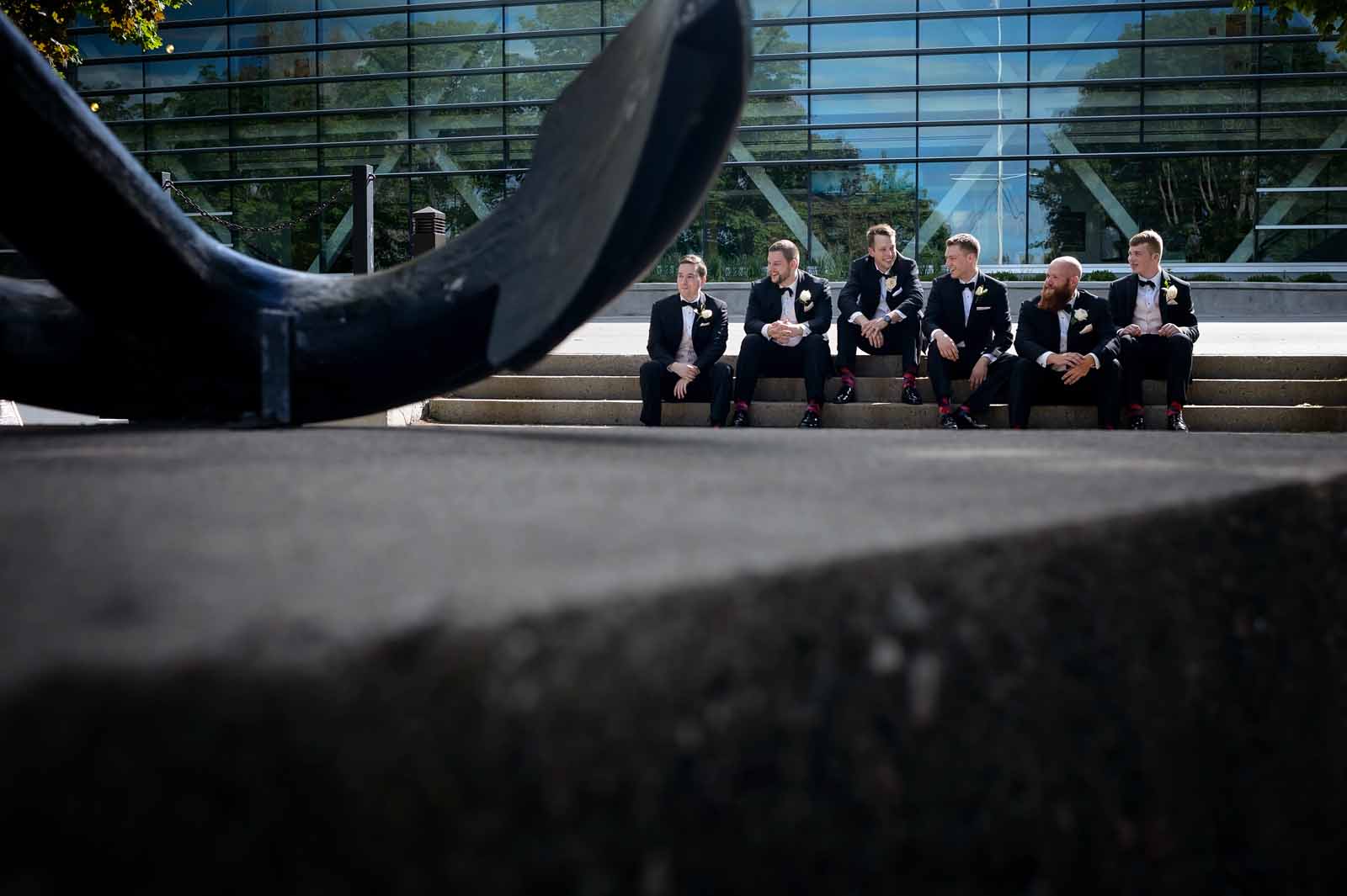 An Ottawa groom and his groomsman chilling outsite the National Art Gallery of Canada