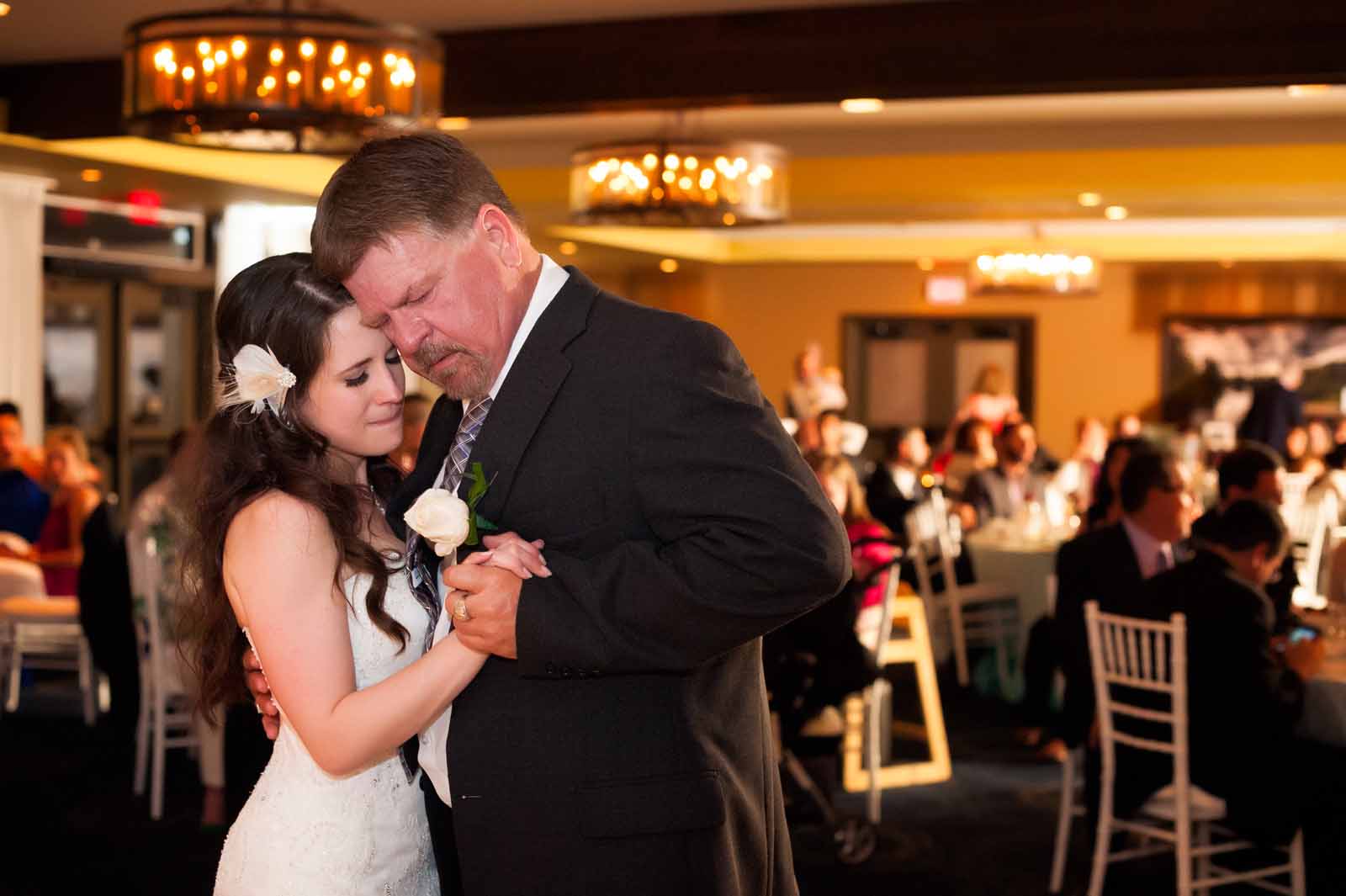 Emotional father daughter dance at a wedding ceremony at a golf club in Ottawa