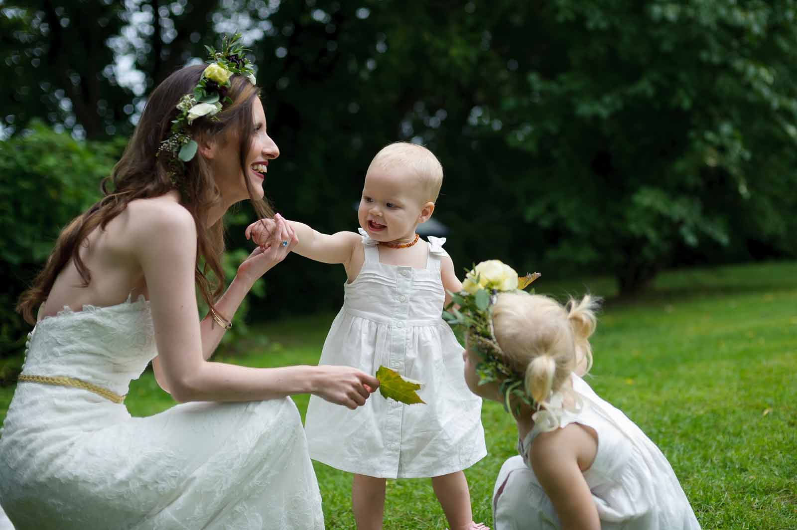Bride with her two young flower girls